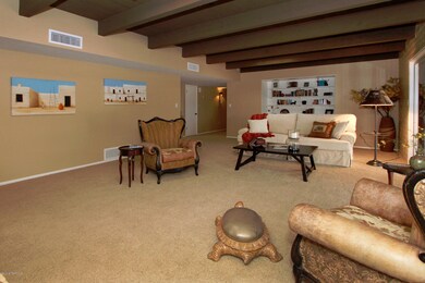 Family Rm w/Fireplace & Beamed Ceiling 2