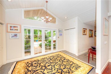 Foyer has 2 closets, sky lights bring this home to