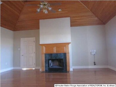 Large den with fireplace