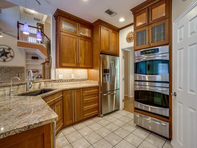 Fabulous kitchen offers custom cabinetry with hard