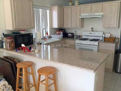 Kitchen. The kitchen features Granite counters, ti