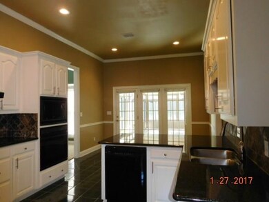 kitchen has been remodeled with updated granite co