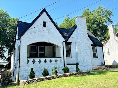 View of front of property with a front yard