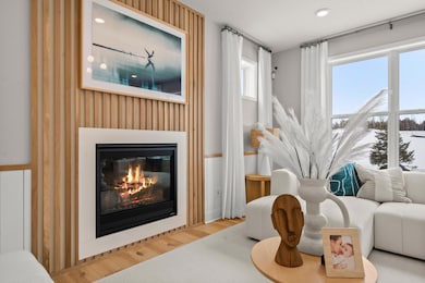 A gas fireplace is a beautiful centerpiece to the family room.