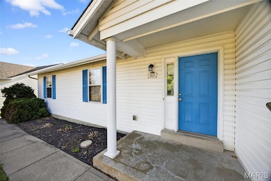 Property entrance with a porch