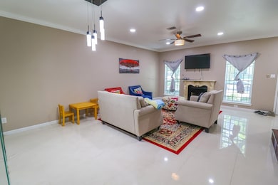 Spacious living room/family room with wood-burning