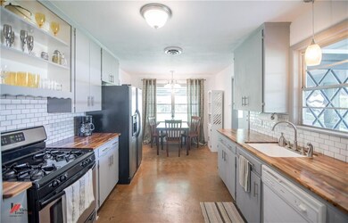 Remodeled kitchen, with acacia board countertops, 