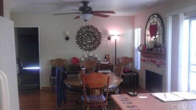 Family room area with fireplace.