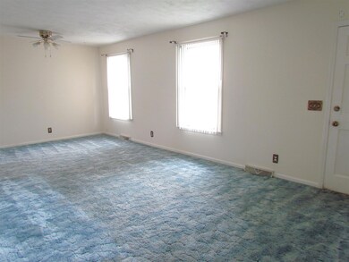 Inside the front door is the living room