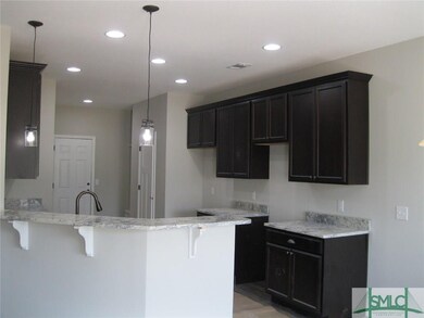 Granite countertops with oil rubbed bronze fixture
