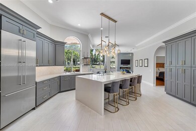New Tasteful Modern Kitchen / Designer Chandelier/Quartz Counters