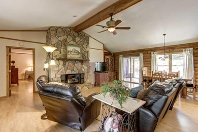 Living room with real stone fireplace