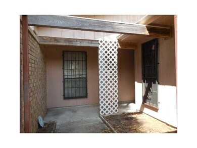 Exterior Front. Front Courtyard