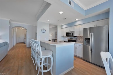 Large island and beautiful back splash