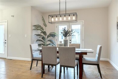 Dining area with french doors opening up to the fr