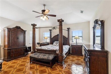 Large primary suite! Custom built in bookshelf. Hu