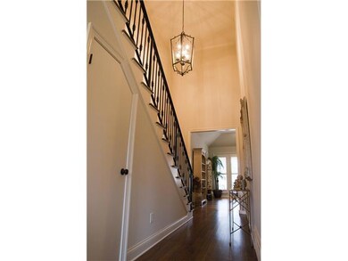 Spacious entry with staircase facing the back of h