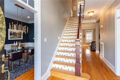 View from foyer, notice the triple crown molding a