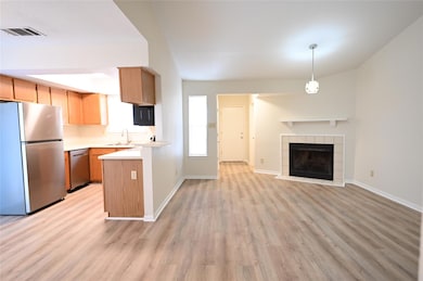 Kitchen featuring appliances with stainless steel