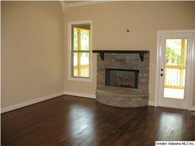 Hardwood in living areas (kitchen, breakfast room,