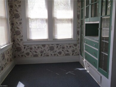Breakfast Nook has windows all two walls and stora