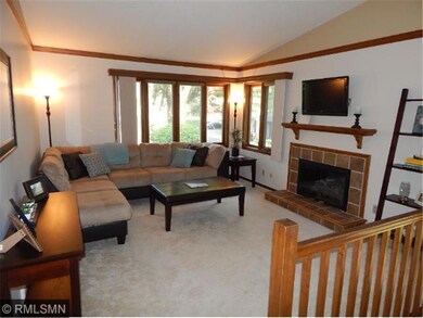 Large living room with vaulted ceilings and focuse