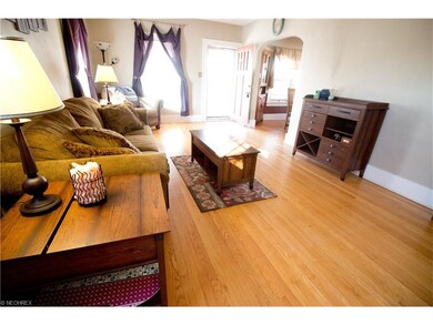 Large living room with oak flooring
