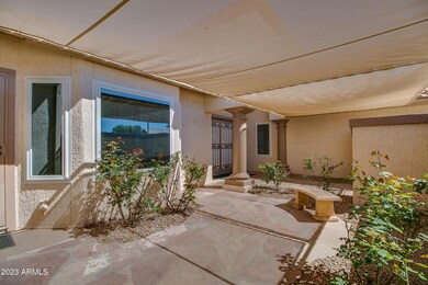 Beautiful Front Courtyard with Rose Bush