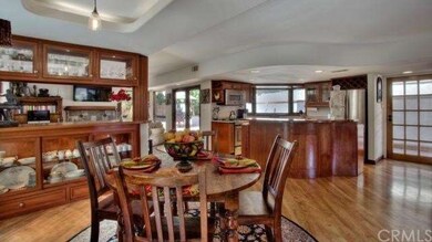 Dining area with buffet looking toward kitchen and
