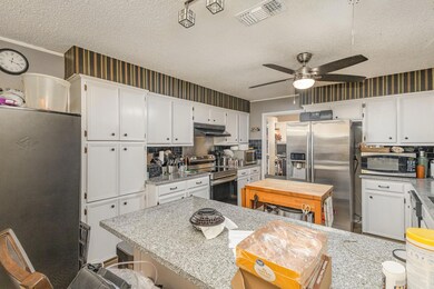 Kitchen featuring stainless steel appliances, deco