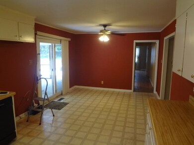 Kitchen and breakfast area coming in from the den. 