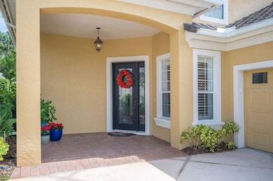 The front entrance features an oversized covered porch.