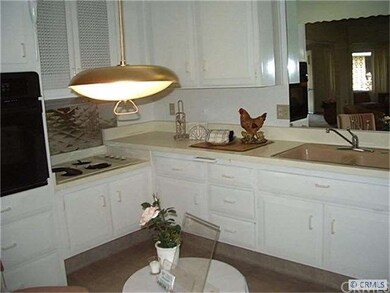 All kitchen cabinets have NEW bright paint inside 