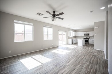 Unfurnished living room with light wood-style floo