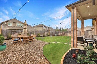 This backyard offers extended outdoor living! The lights are staying, easy remote controlled.