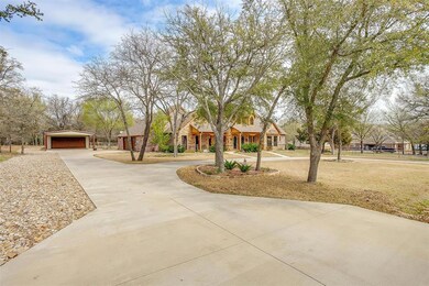 Shop just off driveway next to garage.