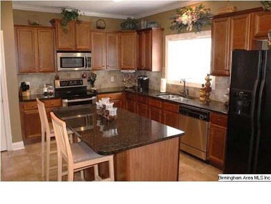 Beautiful kitchen! Lots of custom cabinets, pantry