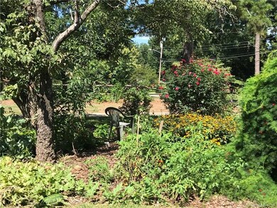 A place to sit and enjoy the natural area and gard