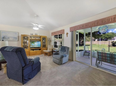 Enjoy your spacious living room and a view of your tranquil back yard
