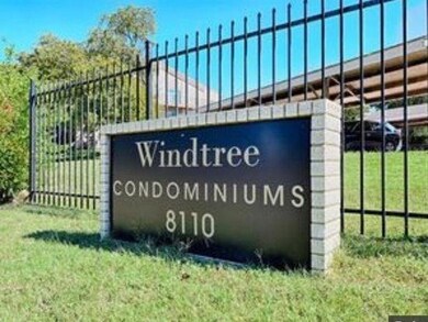 Community sign with a lawn