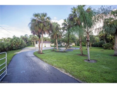 Gated entry with circle drive and plenty of parkin