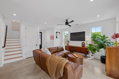 Living area featuring recessed lighting, visible 