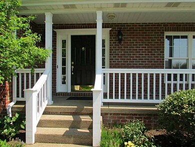 Exterior Front. Welcoming front porch and front do