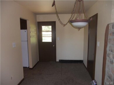 Dining room and door to backyard.