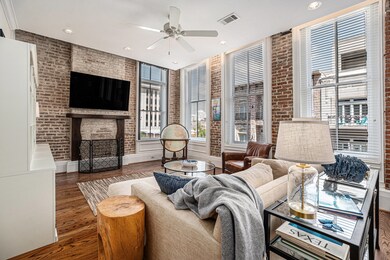 Walls of windows with plantation shutters...