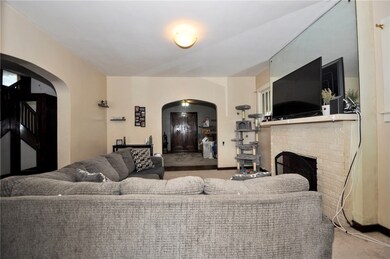 The living room showing the dining room straight a