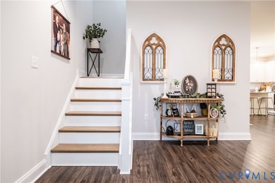 Welcoming Foyer and entry with stair landing
