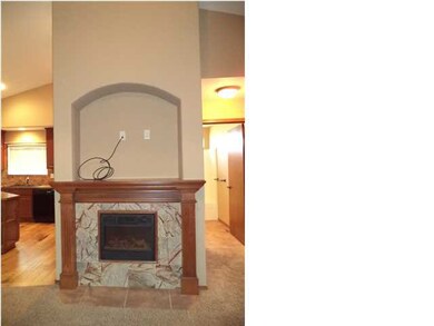 Floor to ceiling fireplace is a wonderful focal po