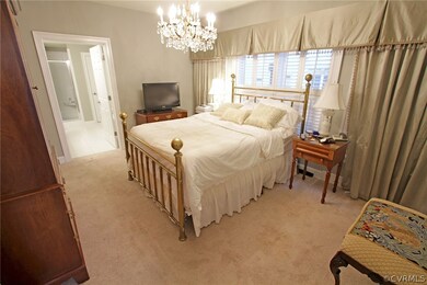 Master Suite with his and her walk-in closets.
