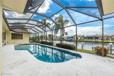 View of swimming pool featuring a patio, glass enc